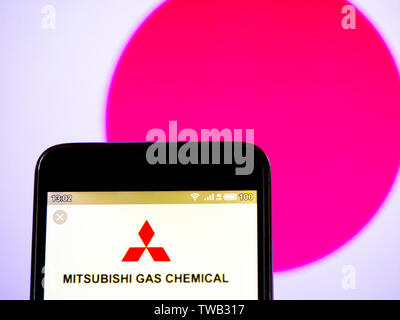 In this photo illustration the Mitsubishi Gas Chemical Company logo is seen displayed on a smartphone Stock Photo