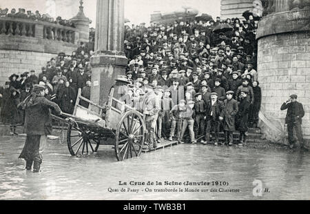 Floods in Paris, France - Quai de Passy - Transport by Cart Stock Photo