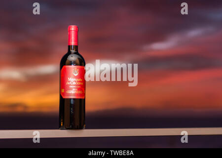 Tenerife, Spain - FEBRUARY 21, 2014: Photo of a Marques de Caceres  bottle of Rioja wine. MArques de Caceres Rioja is crafted with grapes from top cla Stock Photo