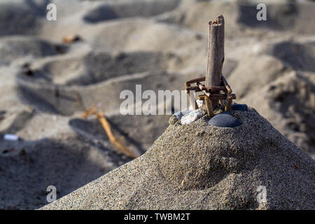 Playing in the sand on a beach Stock Photo