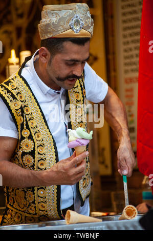 Traditional Turkish Ice Cream Sellers along Istiklal Street on the European side of Istanbul, Turkey Stock Photo