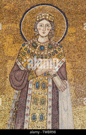 St Agnes (dressed as an empress) being given the Crown of Martyrdom - Byzantine-style mosaic, circa 625 AD - Basilica di Sant'Agnese fuori le Mura Stock Photo