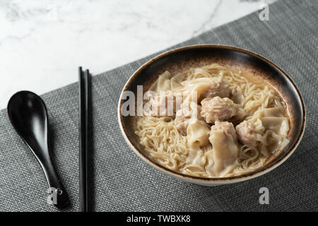 Cloud noodles on a marble table. Stock Photo