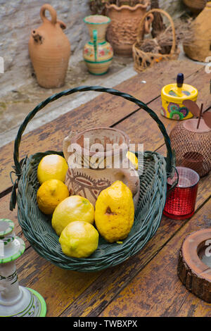 Still life. Objects of garden decoration. Lemon Stock Photo