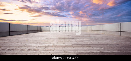 Empty brick floor in cloudsky Stock Photo