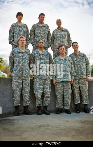 Portrait of a group of US Army soldiers posing for a photograph. Stock Photo