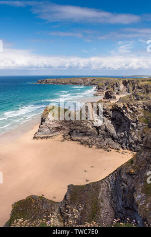 The rugged, spectacular coastline at Carnewas and Bedruthan Steps on the North Cornwall Coast. Stock Photo