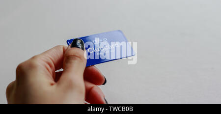 London, England 2019, Keyfob Tesco clubcard, contactless, isolated and on a white background, keyring Stock Photo