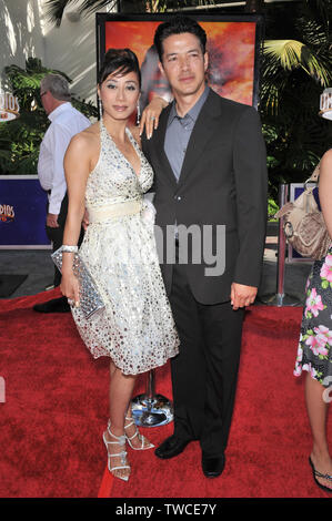 LOS ANGELES, CA. July 27, 2008: Russell Wong & wife at the premiere of 'The Mummy: Tomb of the Dragon Emperor' at Universal Studios, Hollywood. © 2008 Paul Smith / Featureflash Stock Photo