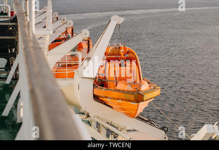 lifeboats on the ferry autumn cruise in the Baltic Sea Stock Photo