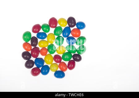 Peanut M&M’s candy multi-color snacks with milk chocolate, candy coating & roasted peanuts by Mars, Inc. on white Stock Photo