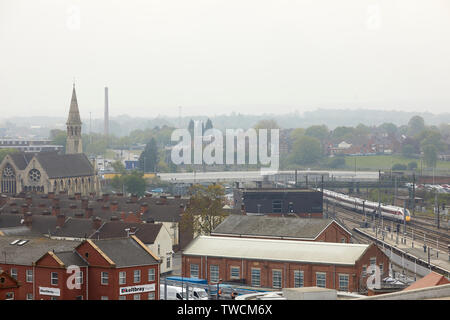 Doncaster town centre,  South Yorkshire, view across the town with a Azuma train class 800 entering the railway station