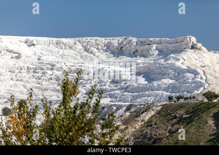 White travertines in the ancient city of Hierapolis in Pamukkale, Turkey. Stock Photo