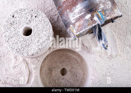Drill for drilling large holes in the wall. Device for making holes for electrical sockets. Place - workshop. Stock Photo