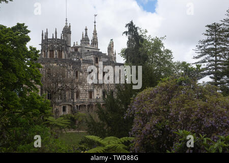 Garden view of the main house at UNESCO World Heritage Site of The Quinta da Regaleira AKA The Palace of Monteiro the Millionaire, Sintra, Portugal. Stock Photo