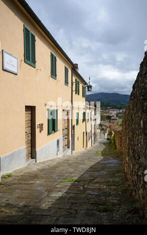Typical alley view of Arezzo old center, in Tuscany, Italy, with its stone buildings Stock Photo