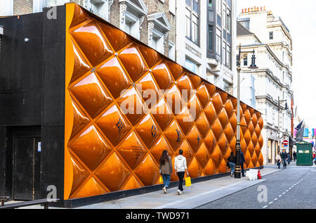 Louis Vuitton large advertising hoarding on New Bond street, London, England,  UK Stock Photo - Alamy