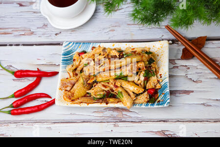 drooling chicken, stick chicken. Stock Photo