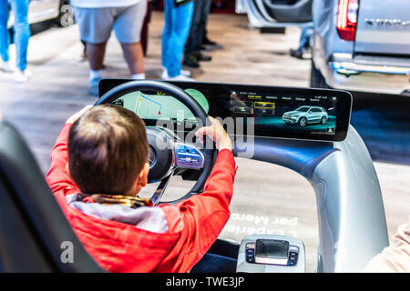 Paris, France, Oct 05, 2018 Mercedes driving simulator, cockpit intuitive intelligent multimedia system MBUX by Mercedes at Mondial Paris Motor Show Stock Photo