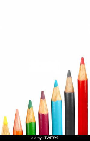 Assorted colored pencils in a row Stock Photo
