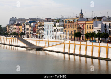 Historic houses on Calle Betis in the Triana district on the banks of the Guadalquivir river, Seville, Spain Stock Photo