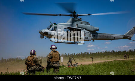 A UH-1Y Venom with Marine Light Attack Helicopter Squadron 775, Marine Aircraft Group 41, 4th Marine Aircraft Wing, takes off during a Forward Arming and Refueling Point operation at Cold Lake Air Weapons Range, Alberta, Canada, June 18, 2019, in support of Sentinel Edge 19. MARFORRES squadrons participate in SE19 to both complete annual training requirements and to increase unit readiness and proficiency. (U.S. Marine Corps photo by Lance Cpl. Jose Gonzalez)