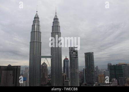 Skyscrapers in a city, Petronas Twin Towers, Kuala Lumpur, Malaysia Stock Photo