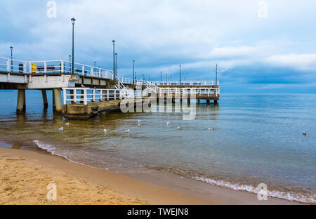 Gdansk, Poland - February 06, 2019: The Pier on the beach at the Baltic Sea coast in Poland Stock Photo