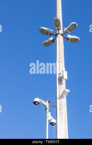 City security, camera surveillance and street lighting Stock Photo