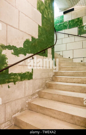 Architectural curved staircase banister stone moss Stock Photo