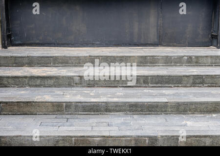 Granite tile floor stairway with black background Stock Photo
