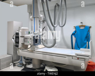 X-ray medical scan machine room with radiation protection vest in hospital Stock Photo