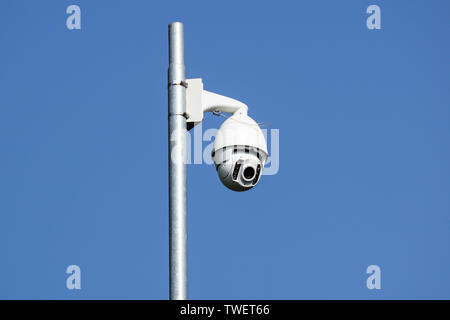 Security camera that sees 360 on light pole . Stock Photo