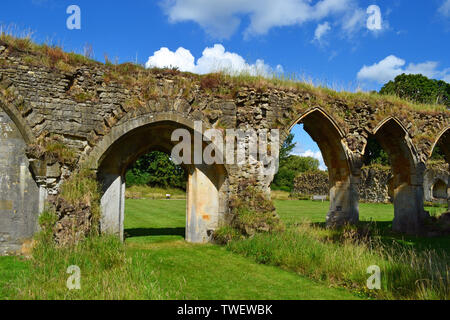 View of the Cloisters and Courtyard, Hailes Abbey, Cistercian abbey, two miles north-east of Winchcombe, Gloucestershire, England, UK Stock Photo