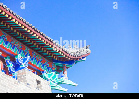 The battlements with an arched eaves of an antique building. Stock Photo