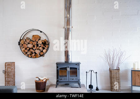 Modern Stove - Log Burning Stove in Modern House with Colorful Brick Style  Tiles as a Background Stock Photo - Alamy