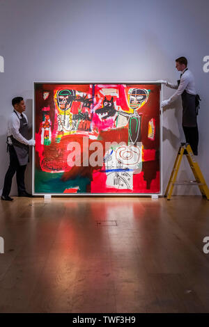 London, UK. 20th June, 2019. Jean-Michel Basquiat (1960-1988), Sabado por la Noche (Saturday Night), 1984, Estimate: £7,500,000-11,000,000 - Christie’s presented an exhibition of works from its upcoming Post-War and Contemporary Art Evening Auction. It will be on view to the public from 21 to 25 June 2019. Credit: Guy Bell/Alamy Live News Stock Photo