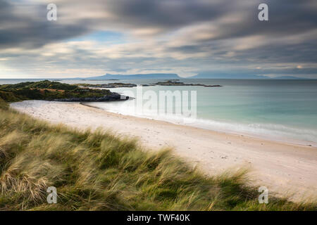 Camusdarach Beach with the Small Isles in the distance. Stock Photo
