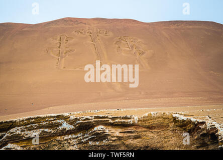 The candelabro, pre-Inca ruins on the coast of Paracas in Peru. Detail photo Stock Photo