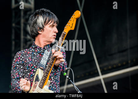 British singer and guitarist Johnny Marr performing live at the All Points East music festival at Victoria Park in East London. Stock Photo