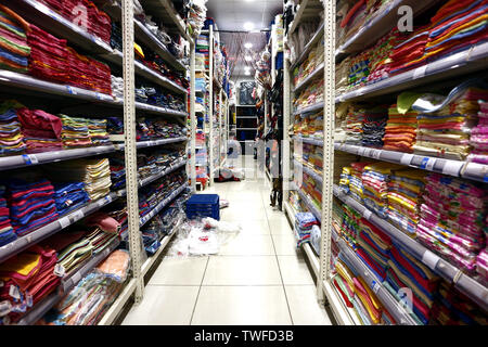 ANTIPOLO CITY, PHILIPPINES – JUNE 18, 2019: Assorted hand, face, bath and kitchen towels on display on shelves at a store. Stock Photo