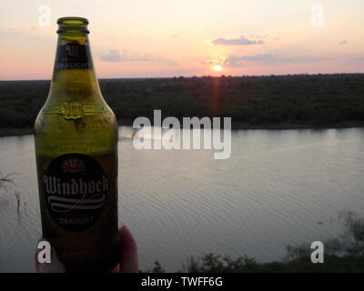 Windhoek lager at sunset Stock Photo