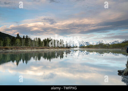 Sunrise over Mount Moran, Snake river in the foreground Stock Photo