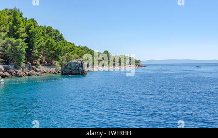 Adriatic Sea beach in the resort town of Brela, Croatia. Stock Photo