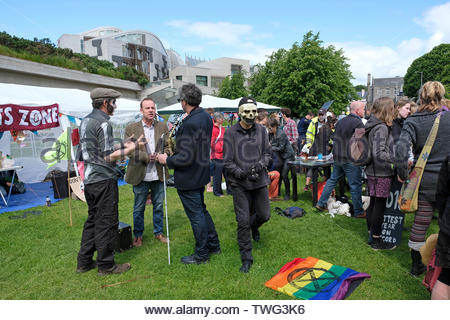 Edinburgh, United Kingdom. 20th June, 2019. Holyrood Rebel Camp, Hosted by Extinction Rebellion Scotland in the grounds of Holyrood Park outside the Scottish parliament from Sunday 16th to Thursday 20th June, this is to highlight the carbon reduction cause and to keep the pressure on politicians, who will debate the Climate Bill on the 18th and 25th June.  Credit: Craig Brown Stock Photo