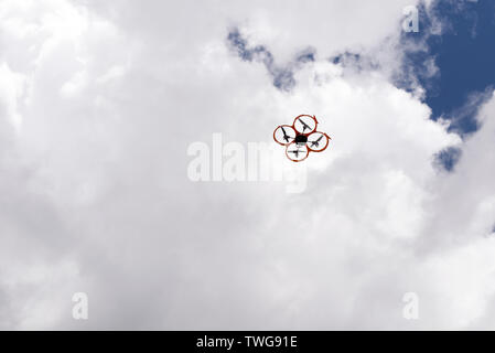 Drone on the clouded sky Stock Photo