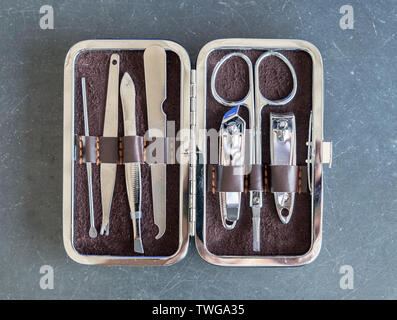 Accessory body care ,clippers,earpick,scissors silver in case Stock Photo