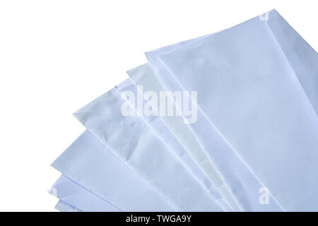 Documents and envelopes stacked on white background Stock Photo