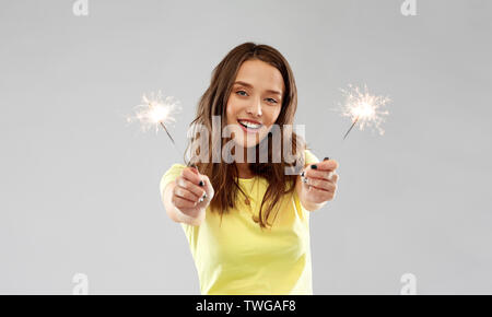 shocked indian man over grey background Stock Photo