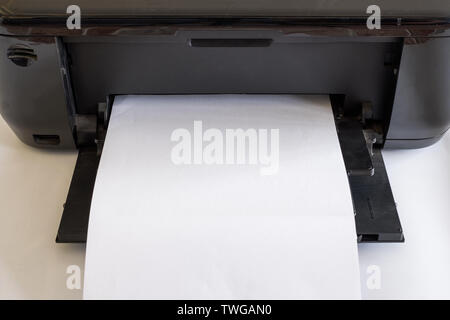 White paper in black printer toner and colors Stock Photo
